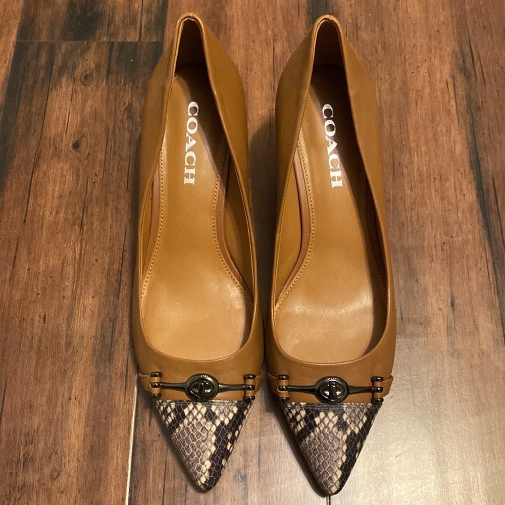 9.5 size tan and snake skin pumps. Like new condition